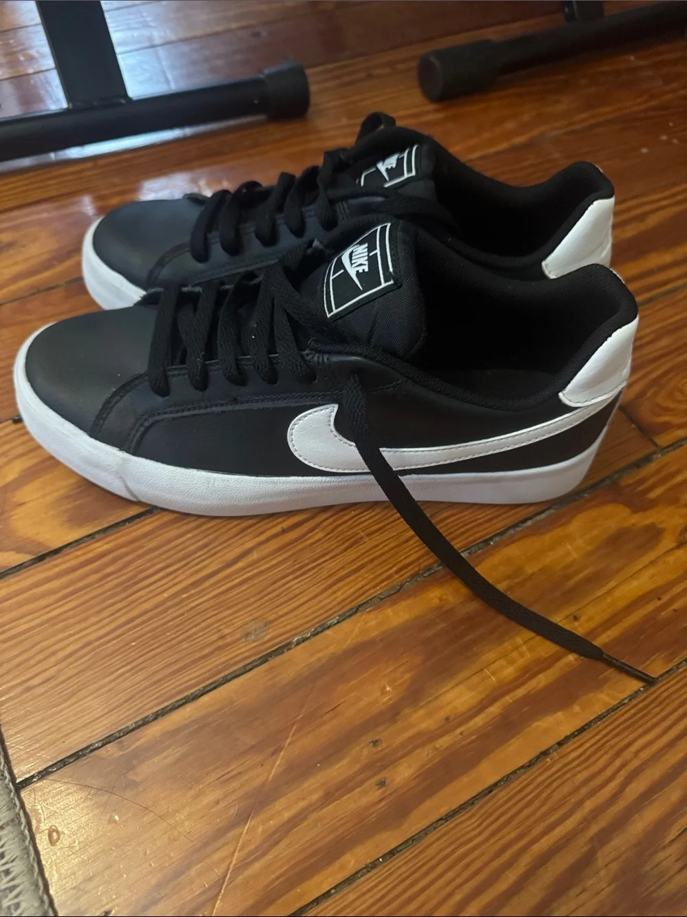 Nike Black Low-Top Sneakers with White Swoosh